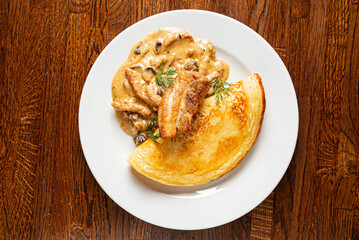 pancakes with bacon and  herbs