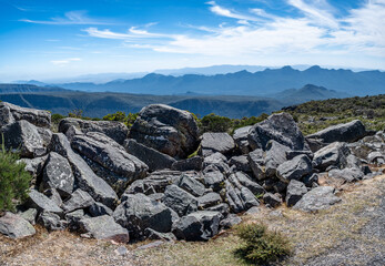 Large boulders and mountains on the horizon under beautiful sky. Grampians, Victoria, Australia