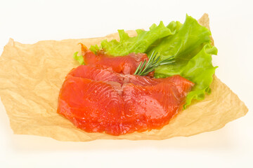 Sliced salmon fillet served rosemary