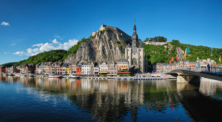 Picturesque Dinant town, Dinant Citadel and Collegiate Church of Notre Dame de Dinant and Pont Charles de Gaulle bridge over Meuse river. Belgian province of Namur, Blegium - obrazy, fototapety, plakaty