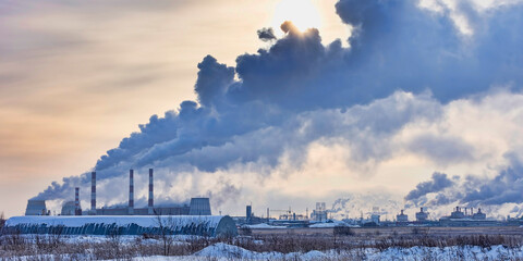 Oil and gas processing plant with smokestacks. Petrochemical industry. Panoramic image.