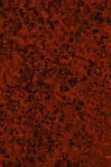 Orange colored abstract wall background with textures of different shades of orange and orange red