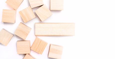 Wooden toy blocks on white background