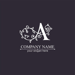 Premium Vector A logo. Monnogram, lettering. Delicate elegant floral pattern of roses. Personal logo or sign for branding an elite company. Vector design.