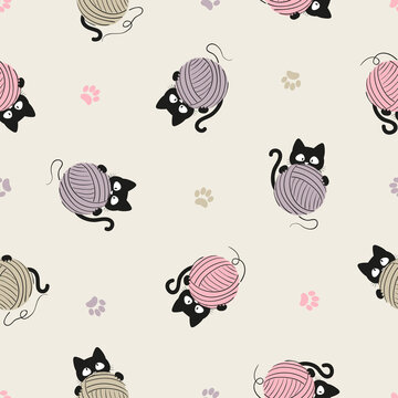Black cats with yarn balls pattern. Seamless knitting background.
