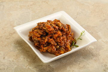 Canned anchovy in tomato sauce