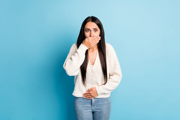Portrait of pretty person arm covering mouth stomach ache feeling bad isolated on blue color...