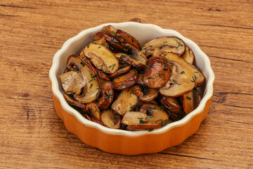 Roasted champignon with herbs and spices