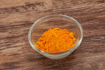 Tumeric powder in the bowl