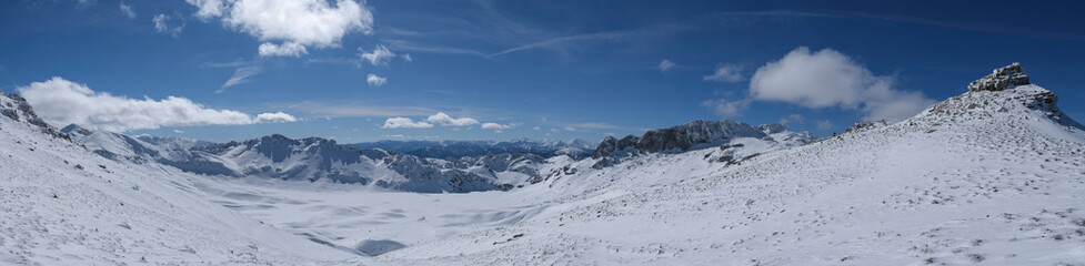 Fototapeta na wymiar Panoramic, mysterious and mystical views of the winter snowy mountains