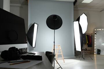 Interior of modern photo studio with professional equipment