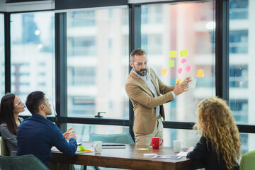 Diversity of African American Businessman, Asian business Group conference and meeting in creative office. Successful Leading Businesspeople Team Stand Folded Hands, Professional Staff Happy Smiling