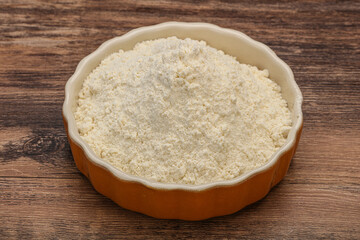 Wheat flour heap in the bowl