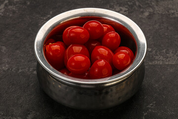 Pickled cherry tomatoes in the bowl