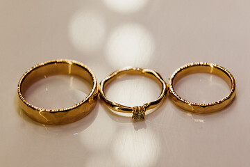 Gold wedding rings close up.