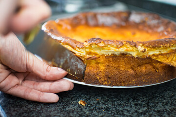 Cheese cake being cut