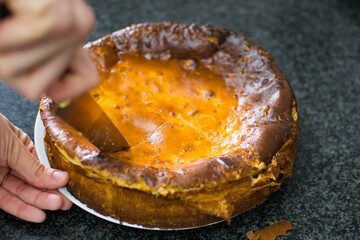 Cheese cake being cut