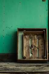 Best ways to store garden accessories. Old wood storage container.