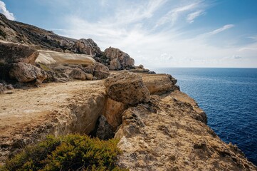 Fototapeta na wymiar rocky coast of the sea in Malta