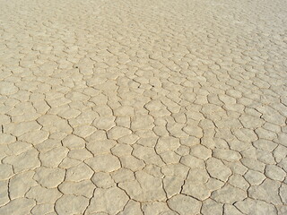 dry and cracked ground at Racetrack Playa in the Death Valley National Park