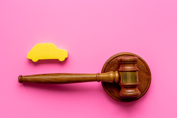 Car and judge hammer - gavel . Insurance law concept
