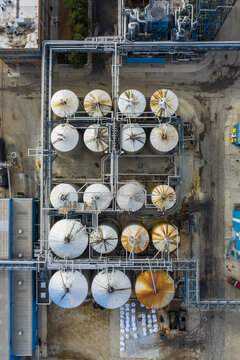 Aerial view of a petrol chemical processing plant and storage facilities.