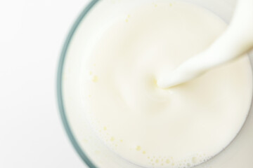 White milk on white background