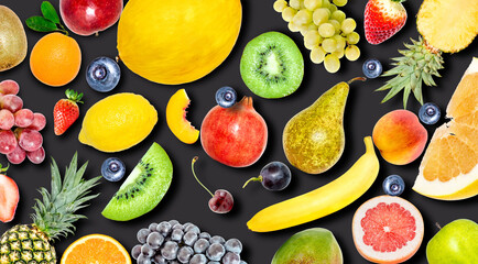 Creative photo of many different exotic tropical bright fruits with shadows on a black background. View from above. Bright summer fruit pattern.
