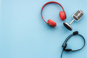Studio microphone and headphones, top view. Recording podcast and streaming concept