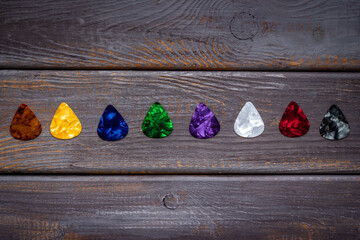 Guitar picks pattern. top view. Music background