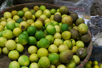 fresh green lime in the traditional market