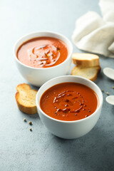 Homemade spicy tomato soup with grilled bread