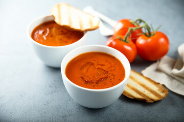 Homemade spicy tomato soup with grilled bread