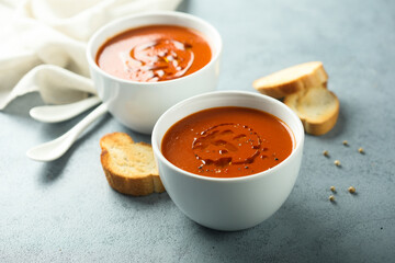 Homemade spicy tomato soup with grilled bread