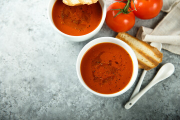Homemade spicy tomato soup with grilled bread