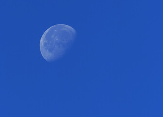big moon against blue sky