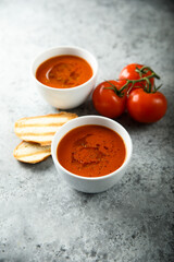 Homemade spicy tomato soup with grilled bread