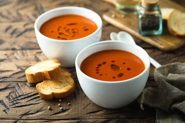 Homemade spicy tomato soup with grilled bread