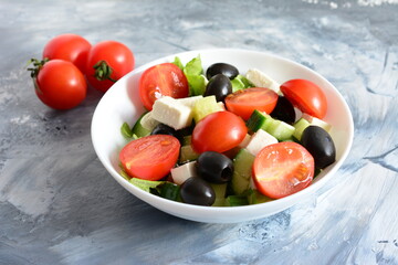 greek salad on the concrete background