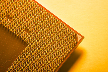 Close-up of a part of a microprocessor in soft focus under high magnification. Details of a computer component under a microscope.