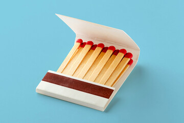 Matchbox on blue background