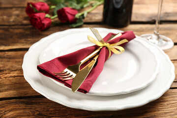 Obraz na płótnie Canvas Beautiful table setting for Valentine's Day dinner on wooden background