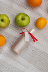 image of homemade cosmetics ingredients. aroma theme. organic cosmetics with extracts of herbs apples, lemons and oranges on white background