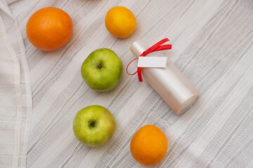 image of homemade cosmetics ingredients. aroma theme. organic cosmetics with extracts of herbs apples, lemons and oranges on white background