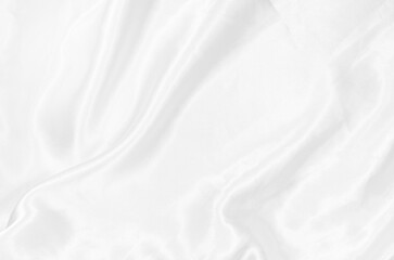 Obraz premium White fabric is satin or silk abstract background which has wrinkles that are very smooth and clean with soft wave design