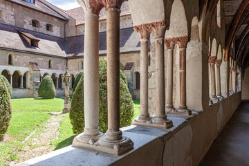 Fototapeta premium Artistic image of old Romanesque cloister in the Brixen cathedral, South Tyrol, Italy 