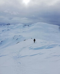 Snowy mountain with the silhouette of a person