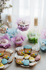 Beautiful Easter cakes on a decorated light table. A light holiday of Easter.