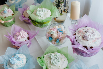 Beautiful Easter cakes on a decorated light table. A light holiday of Easter.