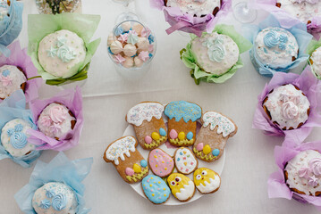 Beautiful Easter cakes on a decorated light table. A light holiday of Easter.